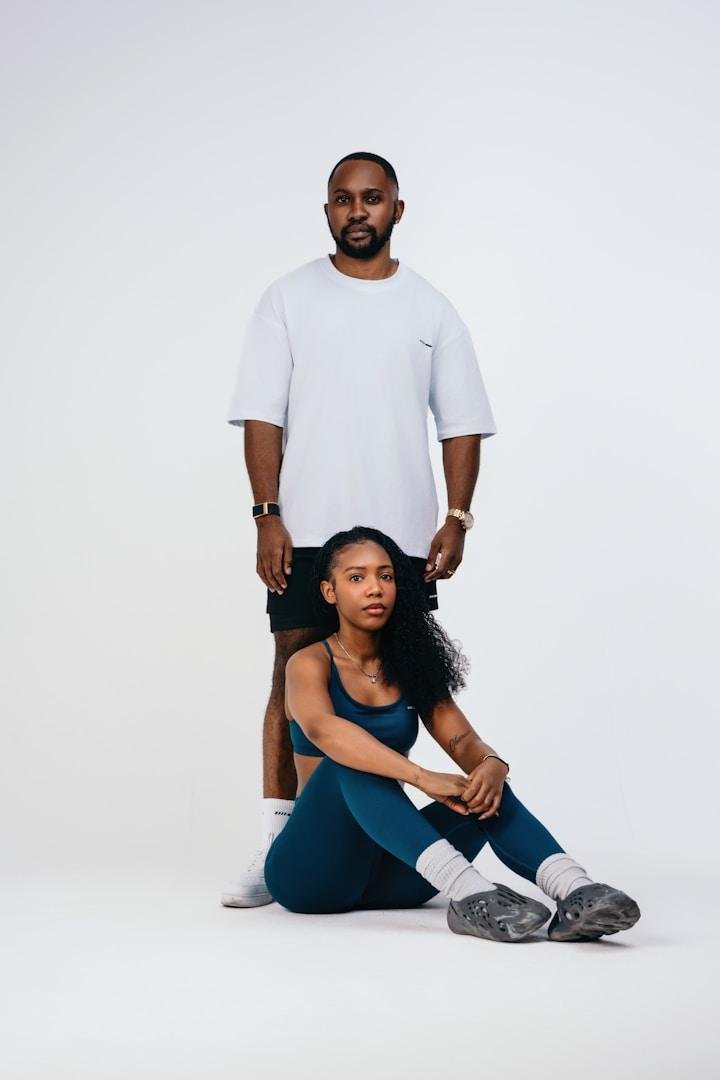 Photo by Jay Soundo A man and a woman pose for a picture